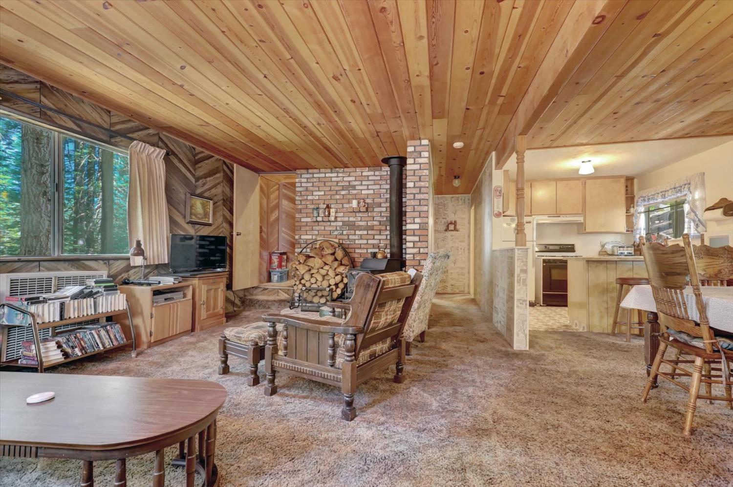 351 Silver Tip Springs Road Strawberry Valley, CA 95981 - Photo 36 of 57 a view of a dining room with furniture window and outside view