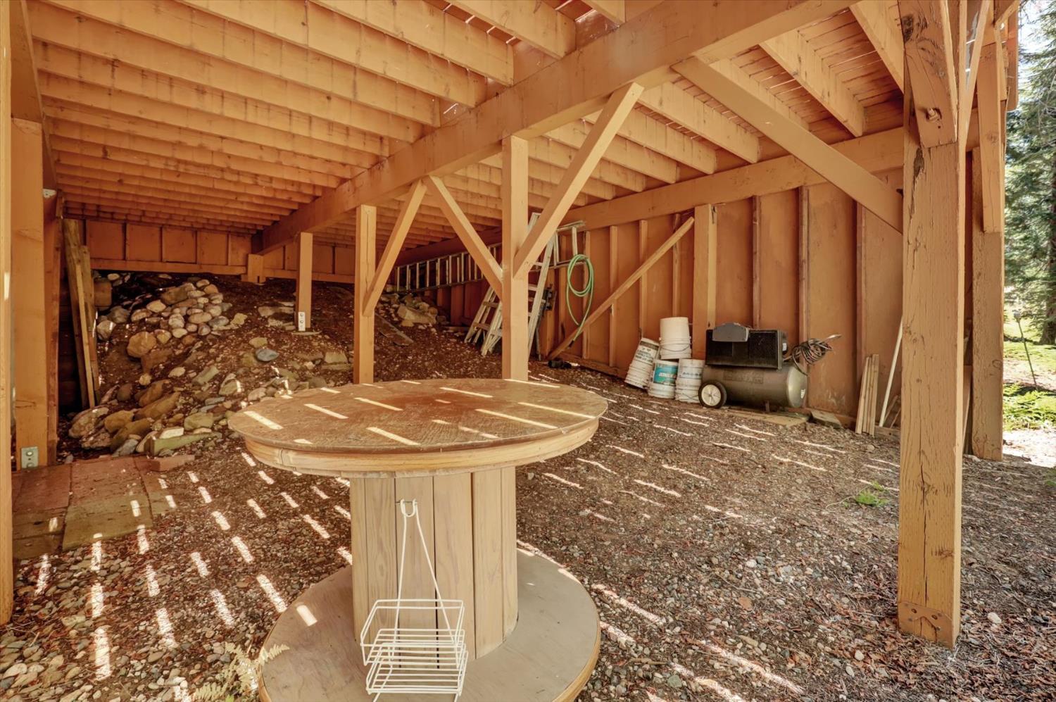351 Silver Tip Springs Road Strawberry Valley, CA 95981 - Photo 39 of 57 a view of a porch with a table and chairs