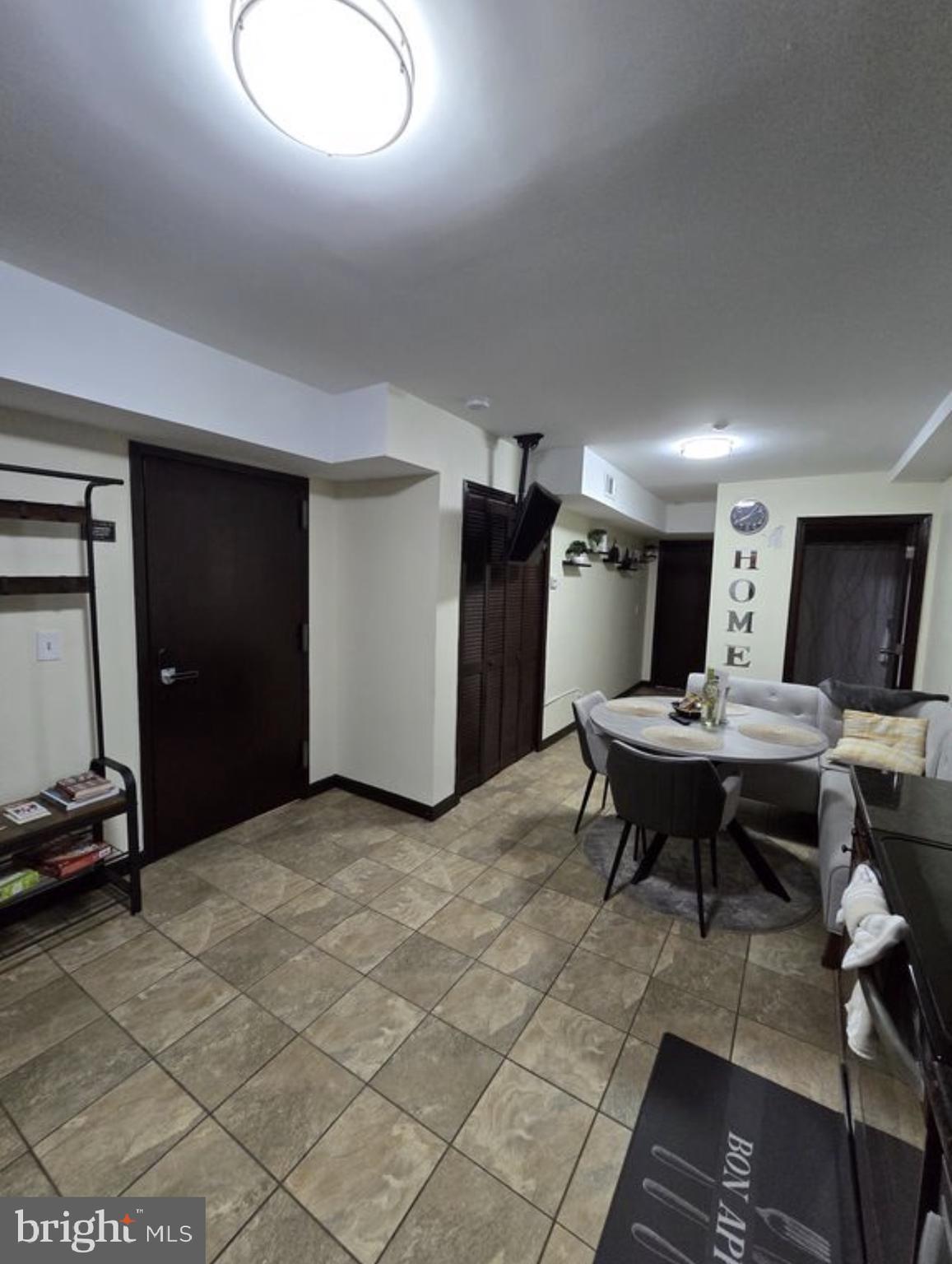 230 Market Street, Unit 4 Philadelphia, PA 19106 - Photo 7 of 10 a view of a livingroom with furniture and a table