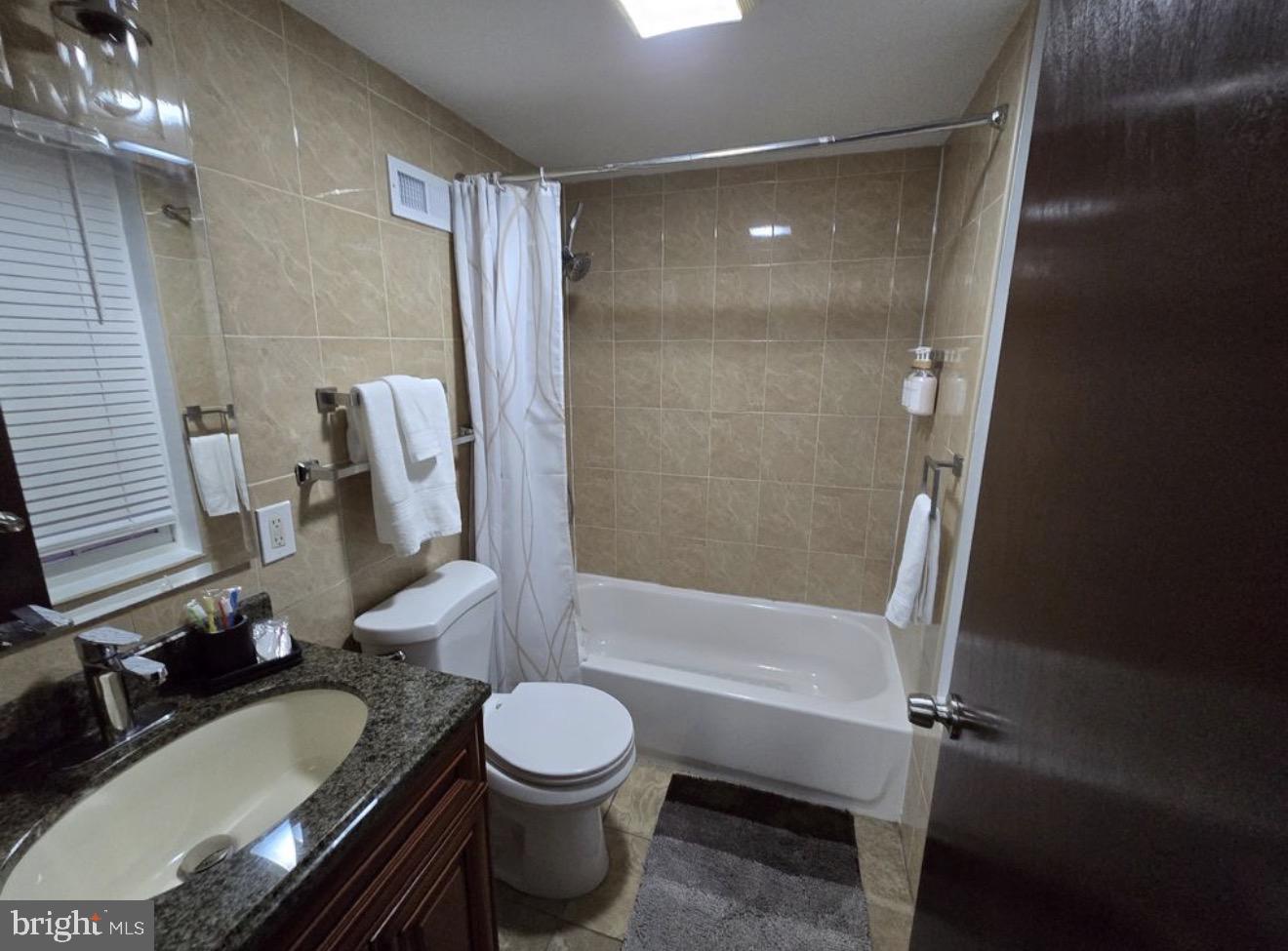 230 Market Street, Unit 4 Philadelphia, PA 19106 - Photo 10 of 10 a bathroom with a sink a toilet and shower