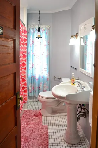 a bedroom with a bed and a closet