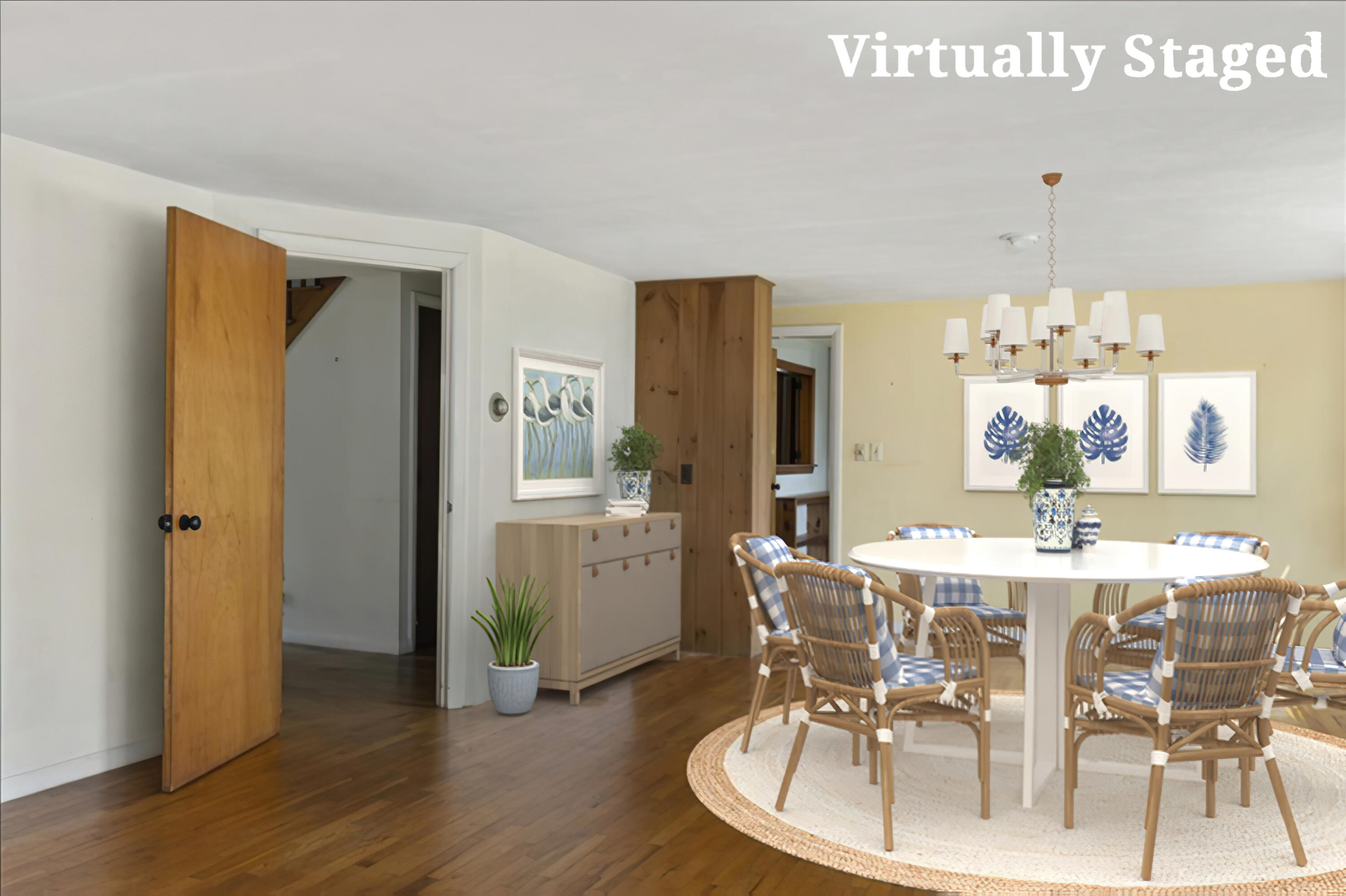 34 Scatteree Road North Chatham, MA 02650 - Photo 19 of 40 a dining room with wooden floor a chandelier a glass table and chairs