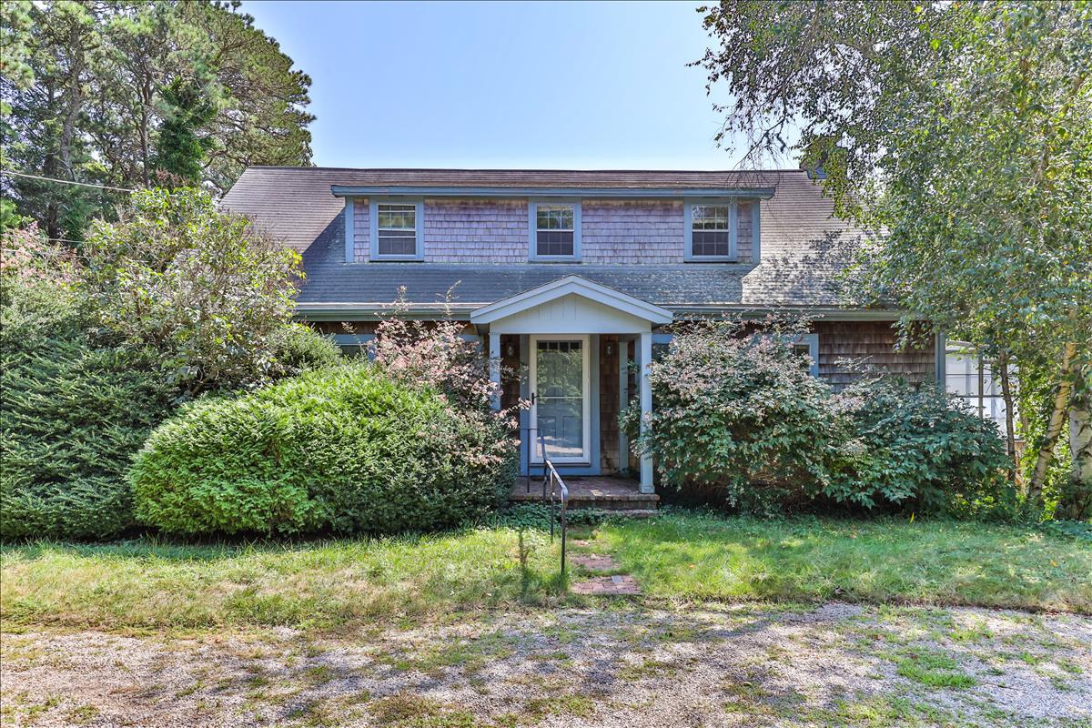 34 Scatteree Road North Chatham, MA 02650 - Photo 2 of 40 a front view of a house with a garden