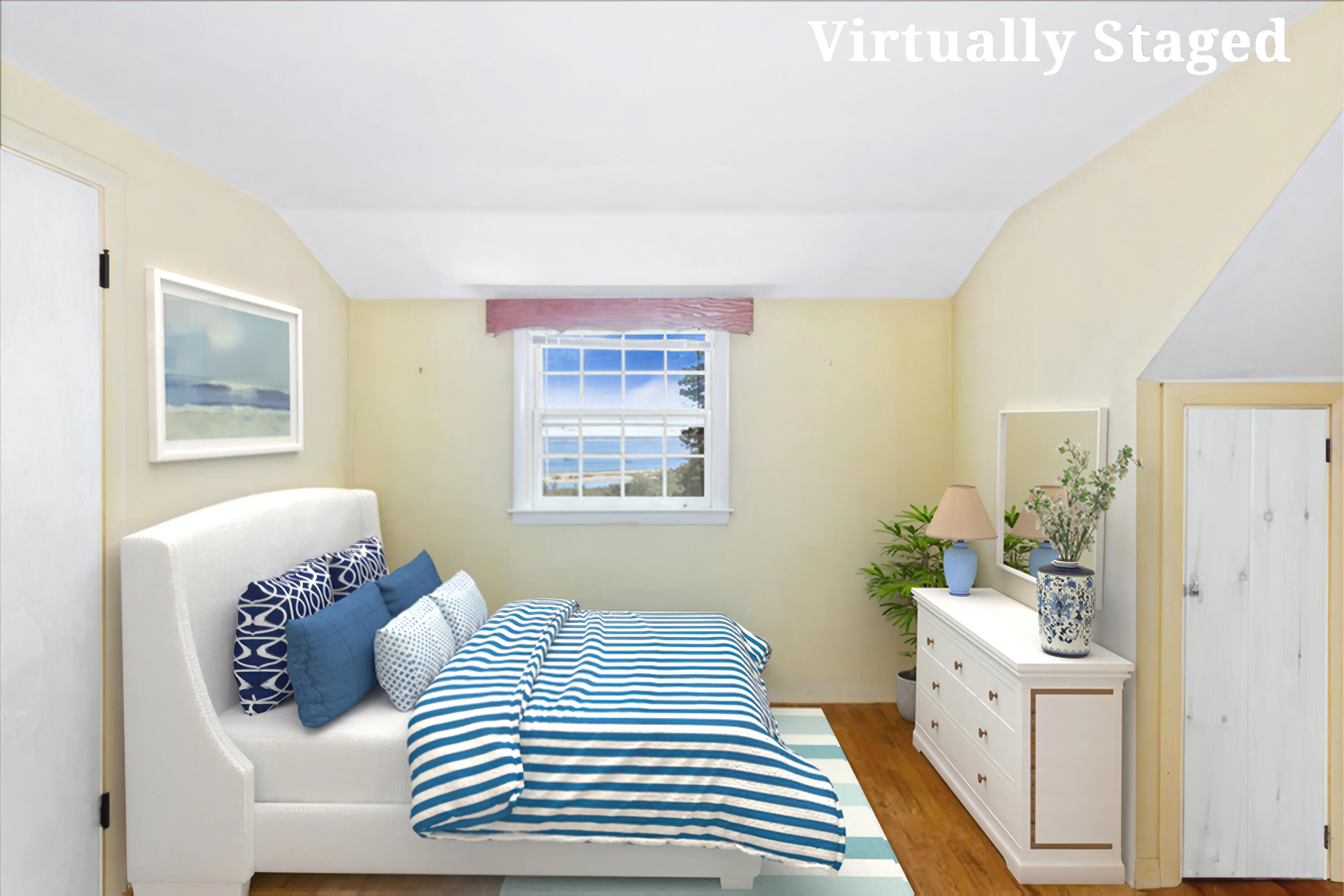 34 Scatteree Road North Chatham, MA 02650 - Photo 30 of 40 a bedroom with a bed and wooden floor