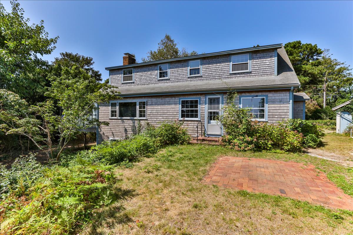 34 Scatteree Road North Chatham, MA 02650 - Photo 31 of 40 a front view of house with yard and trees around
