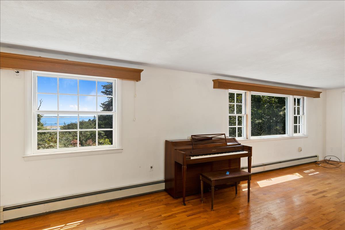 34 Scatteree Road North Chatham, MA 02650 - Photo 8 of 40 a room with furniture and a window