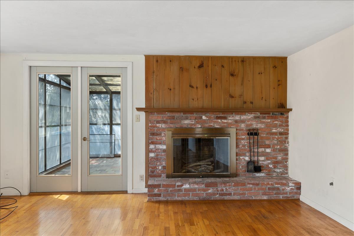 34 Scatteree Road North Chatham, MA 02650 - Photo 10 of 40 a view of fireplace and wooden floor