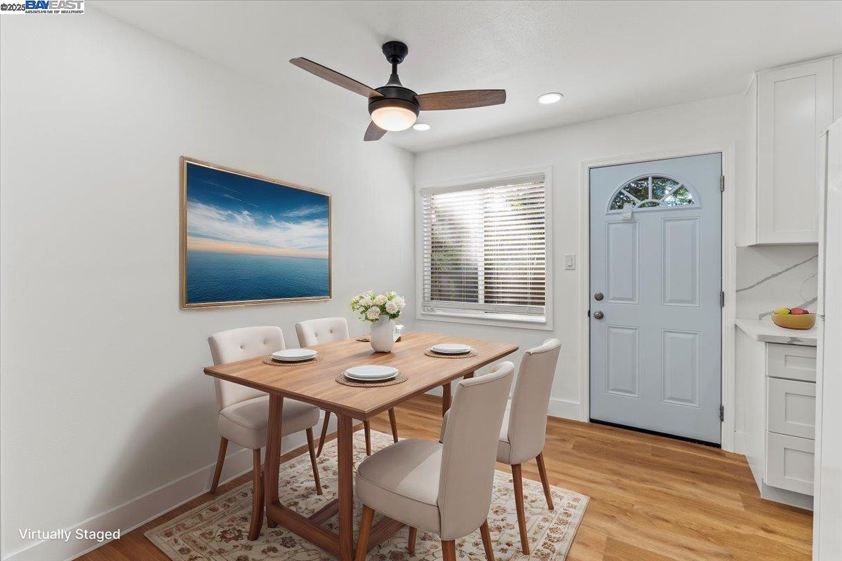 462 Craven Court Hayward, CA 94541 - Photo 11 of 50 a view of a dining room with furniture window and wooden floor