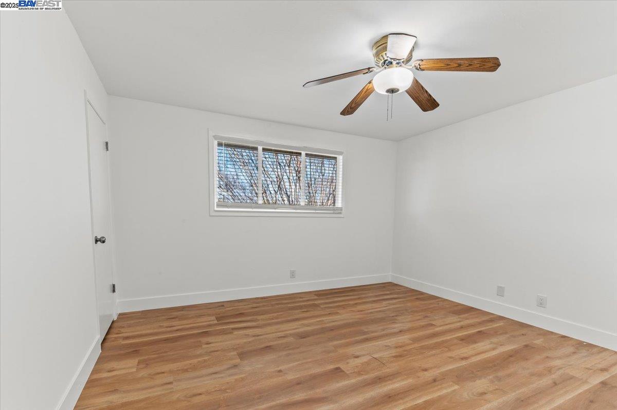 462 Craven Court Hayward, CA 94541 - Photo 30 of 50 a view of empty room with wooden floor