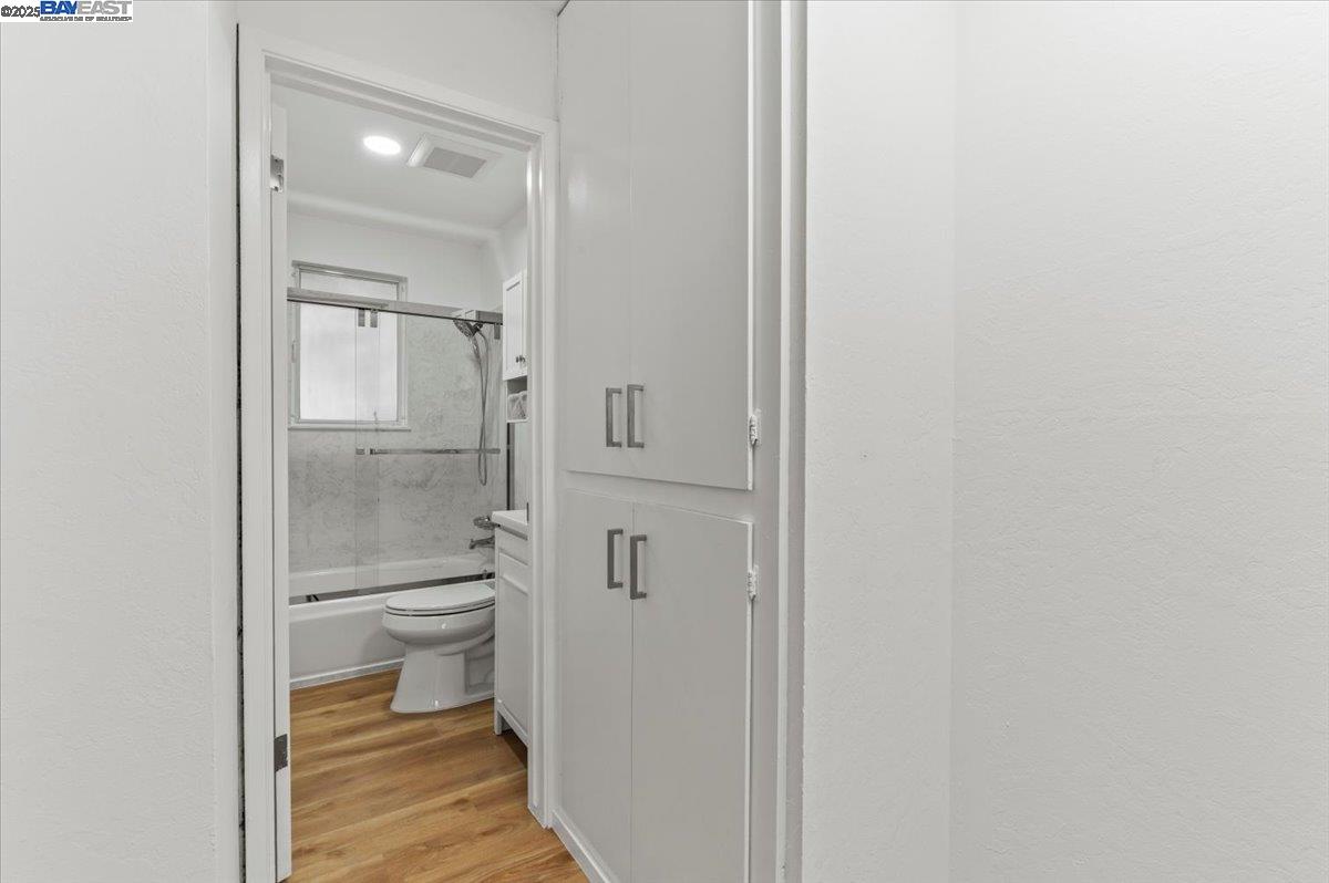 462 Craven Court Hayward, CA 94541 - Photo 33 of 50 a bathroom with a granite countertop toilet and a shower