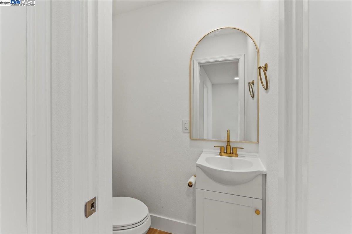 462 Craven Court Hayward, CA 94541 - Photo 37 of 50 a bathroom with a sink a toilet and mirror