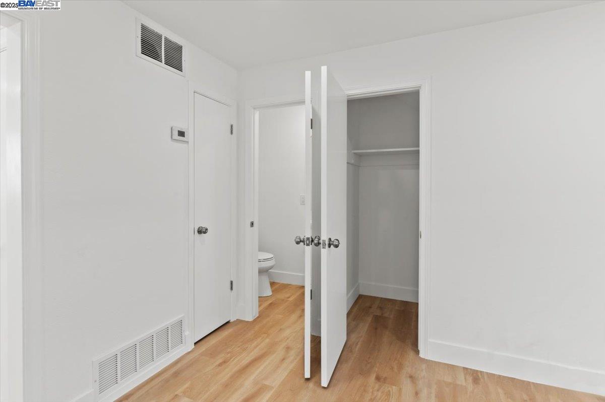 462 Craven Court Hayward, CA 94541 - Photo 42 of 50 a view of a hallway with wooden floor