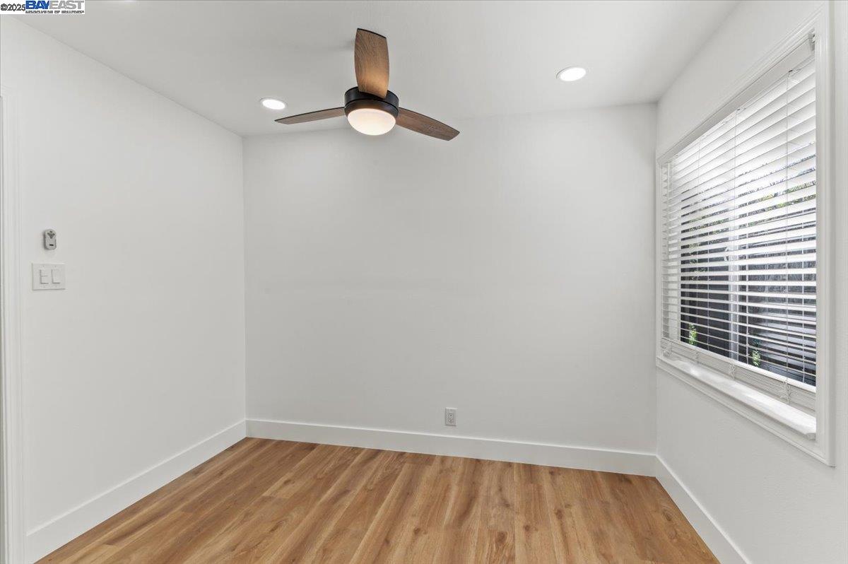 462 Craven Court Hayward, CA 94541 - Photo 47 of 50 a view of wooden floor and windows in a room