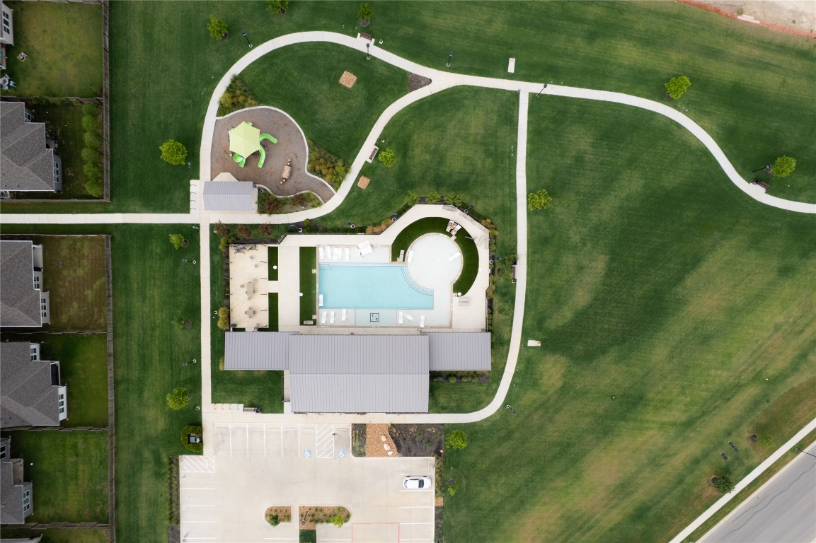 6511 Rounded Pebble Lane Buda, TX 78610 - Photo 23 of 25 Aerial view of property and surrounding area featuring a pool area