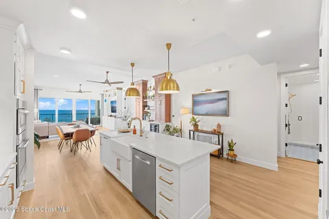 a large bedroom with a large bed and a large window