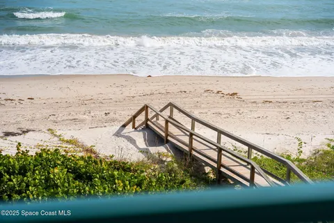 a view of an ocean from a balcony