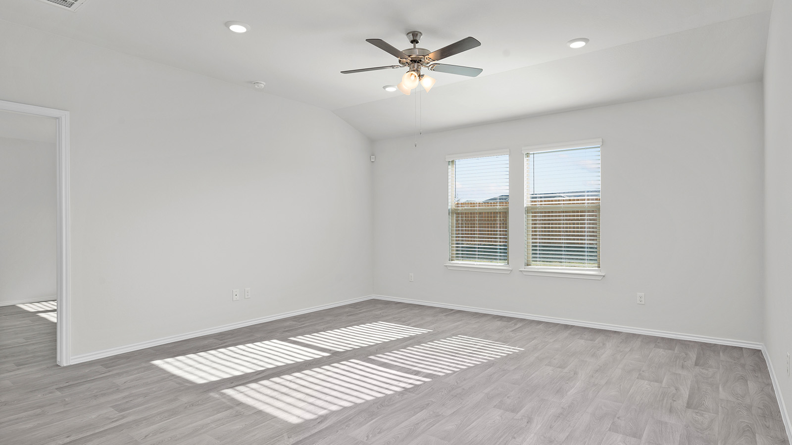 400 Timbo Drive Jarrell, TX 76537 - Photo 8 of 24 an empty room with a window and a ceiling fan