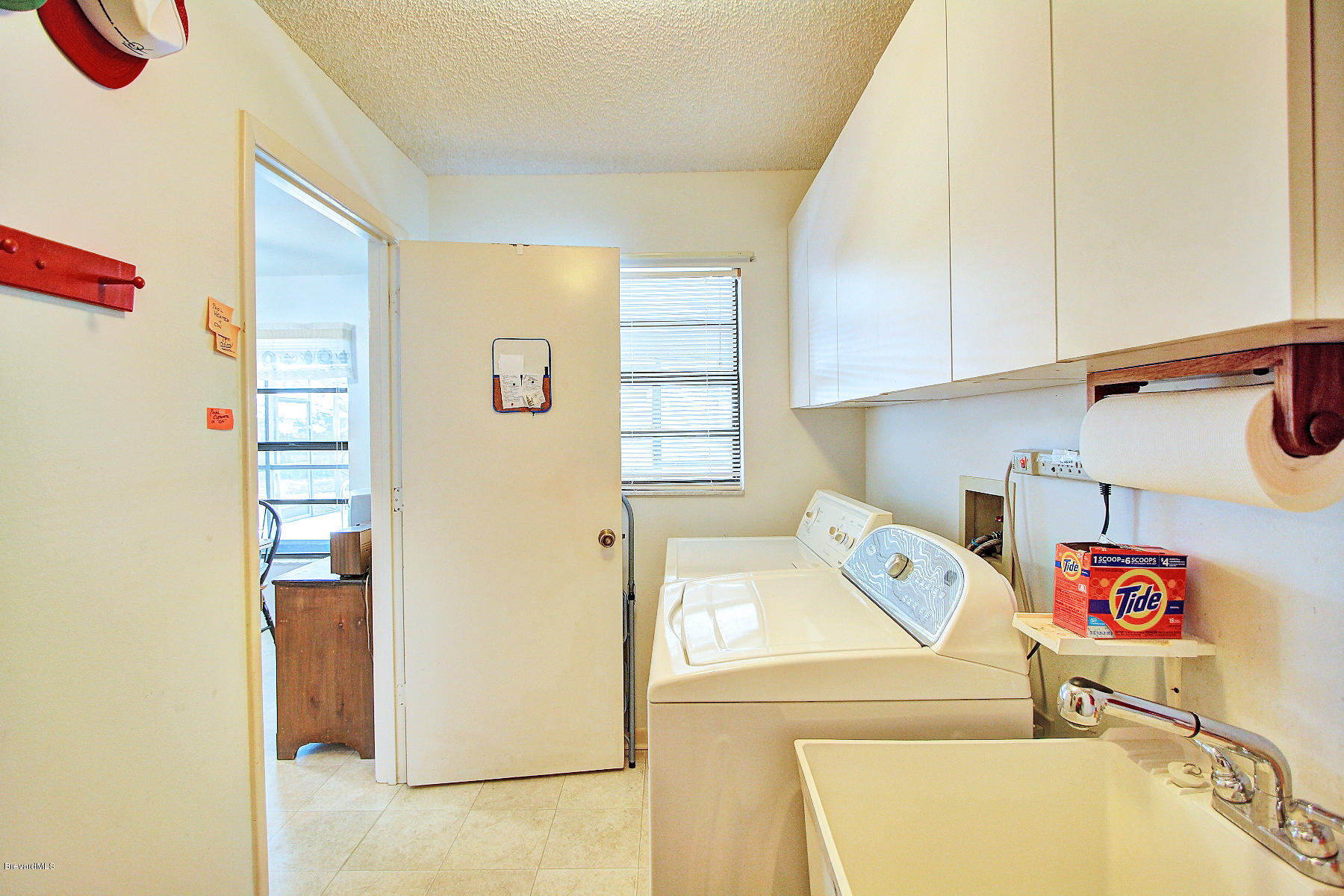 851 Gardener Road Rockledge, FL 32955 - Photo 18 of 25 Large laundry pre-plumbed for 1/2 bath