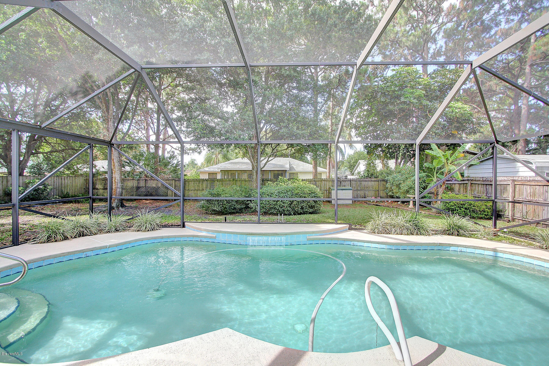 851 Gardener Road Rockledge, FL 32955 - Photo 19 of 25 Free formed solar heated pool