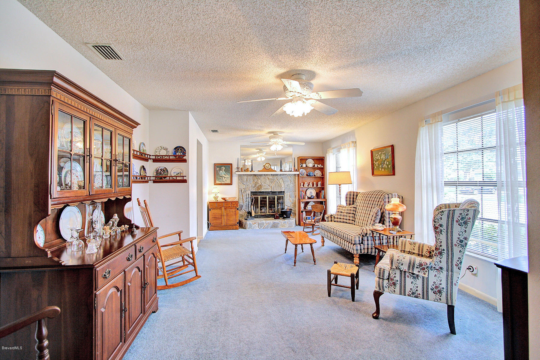851 Gardener Road Rockledge, FL 32955 - Photo 4 of 25 Living/Dinning with Fireplace
