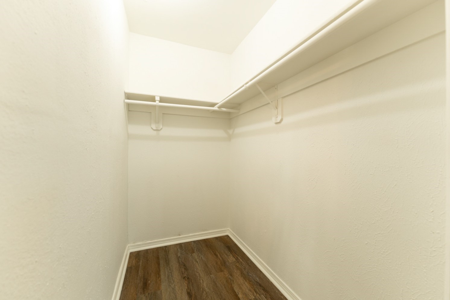 11803 Brook Meadows Lane Meadows Place, TX 77477 - Photo 8 of 17 a view of a room with racks on the wall