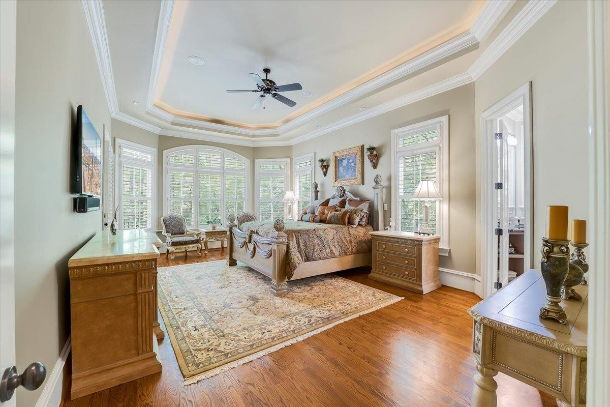 9712 Honeycutt Road Raleigh, NC 27614 - Photo 21 of 83 a living room with furniture and a flat screen tv