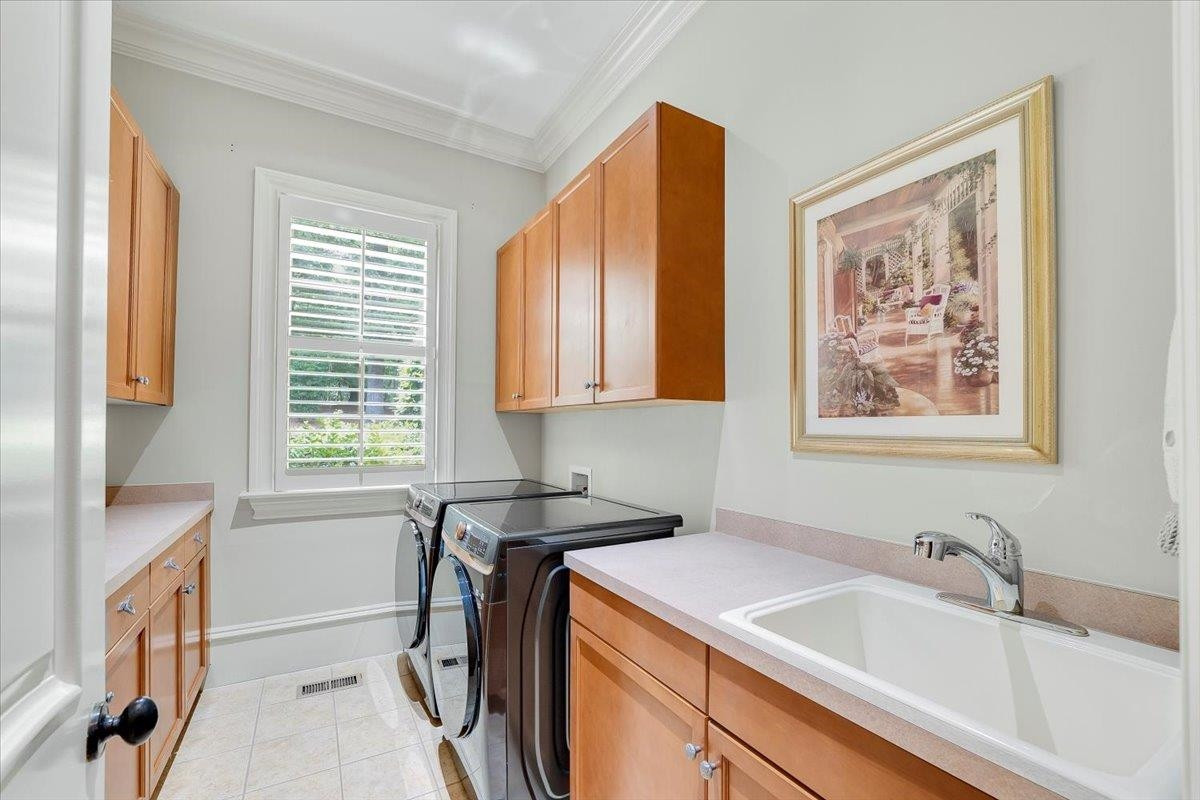 9712 Honeycutt Road Raleigh, NC 27614 - Photo 28 of 83 a bath room with a sink and a bath tub