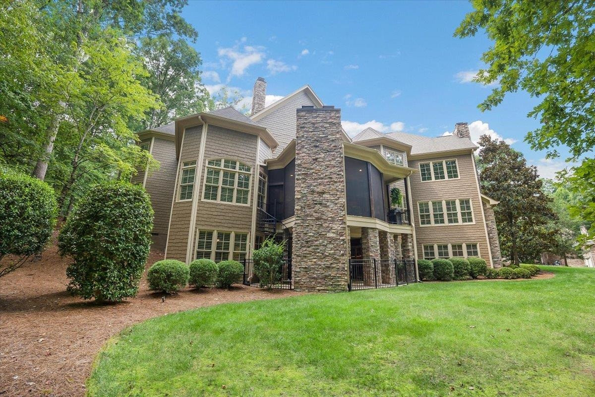 9712 Honeycutt Road Raleigh, NC 27614 - Photo 3 of 83 front view of a house with a yard