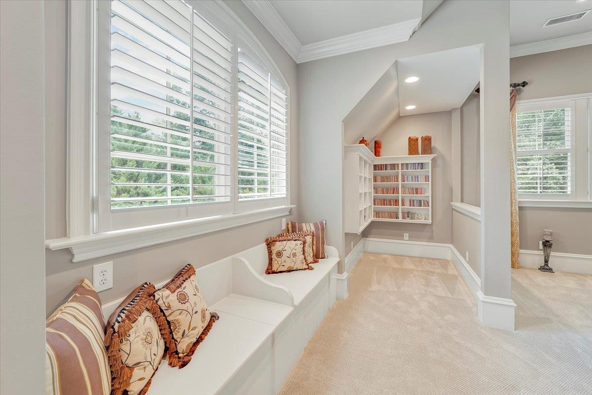 9712 Honeycutt Road Raleigh, NC 27614 - Photo 36 of 83 a spacious bedroom with a bed and a large window