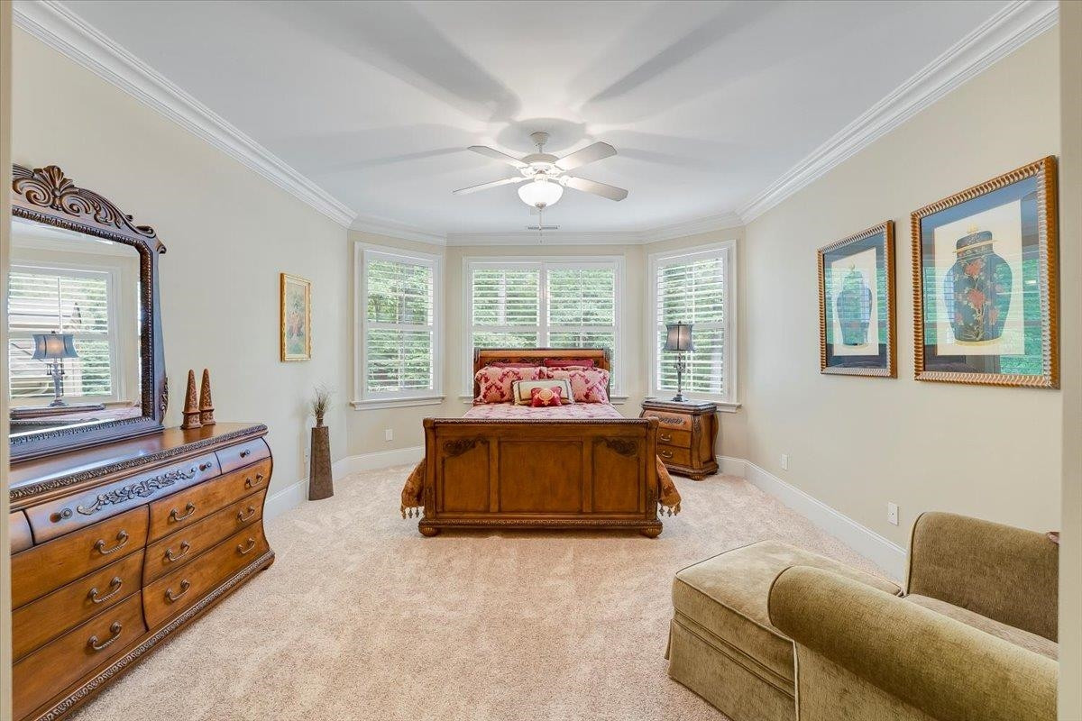 9712 Honeycutt Road Raleigh, NC 27614 - Photo 39 of 83 a living room with furniture and a large window
