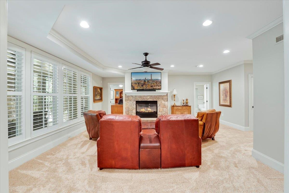 9712 Honeycutt Road Raleigh, NC 27614 - Photo 46 of 83 a living room with fireplace furniture and a large window