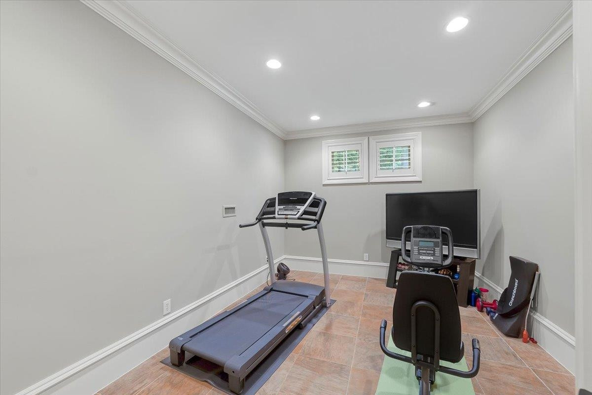 9712 Honeycutt Road Raleigh, NC 27614 - Photo 54 of 83 a view of a workspace with furniture and a window