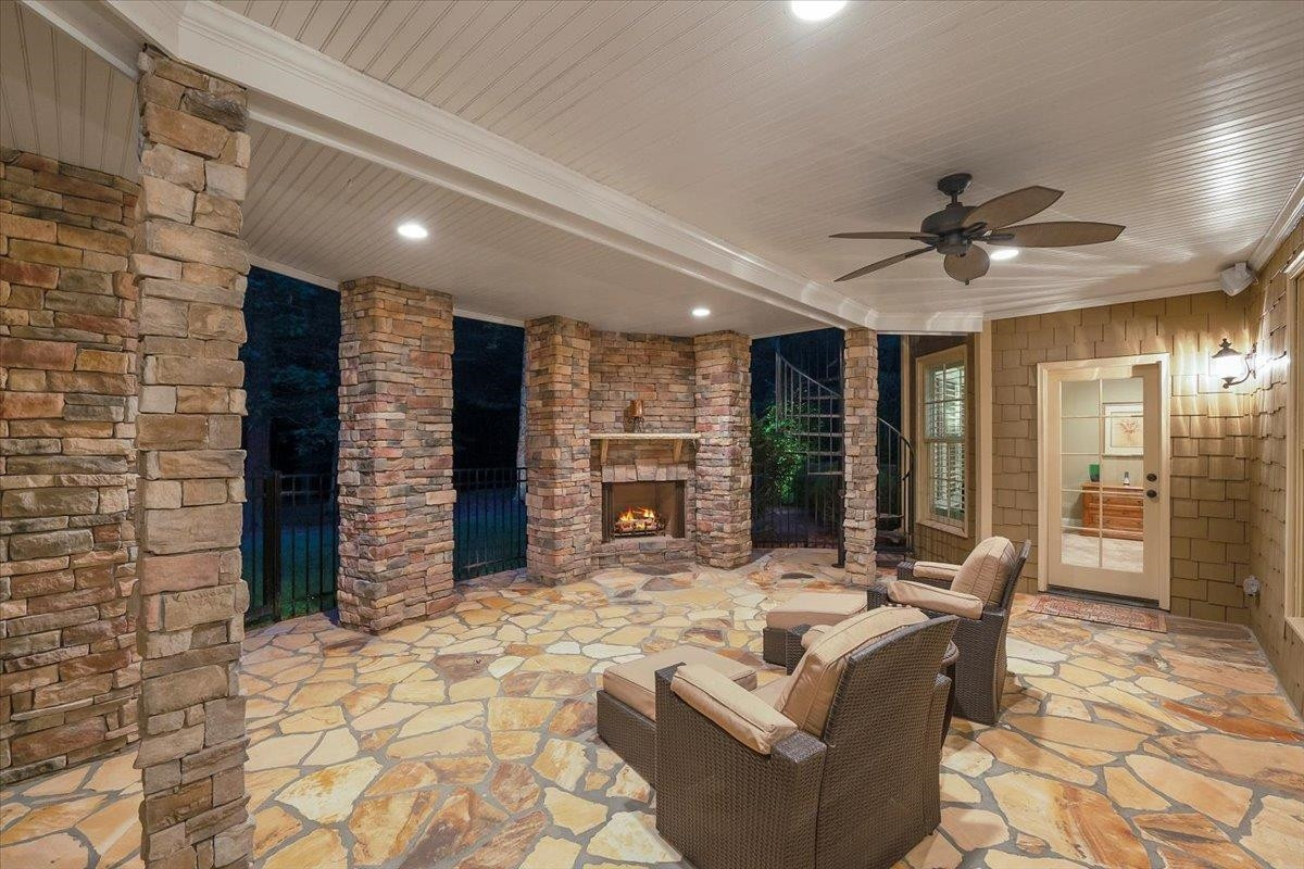 9712 Honeycutt Road Raleigh, NC 27614 - Photo 57 of 83 a living room with fireplace furniture and a ceiling fan