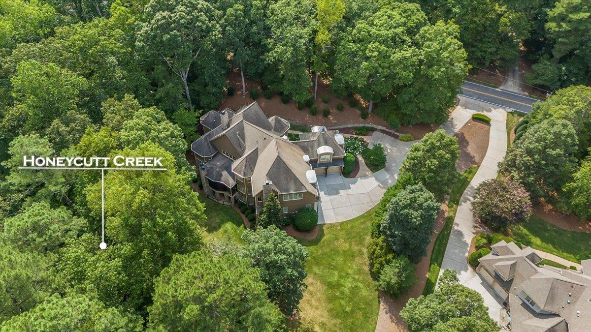 9712 Honeycutt Road Raleigh, NC 27614 - Photo 62 of 83 an aerial view of a house with a yard