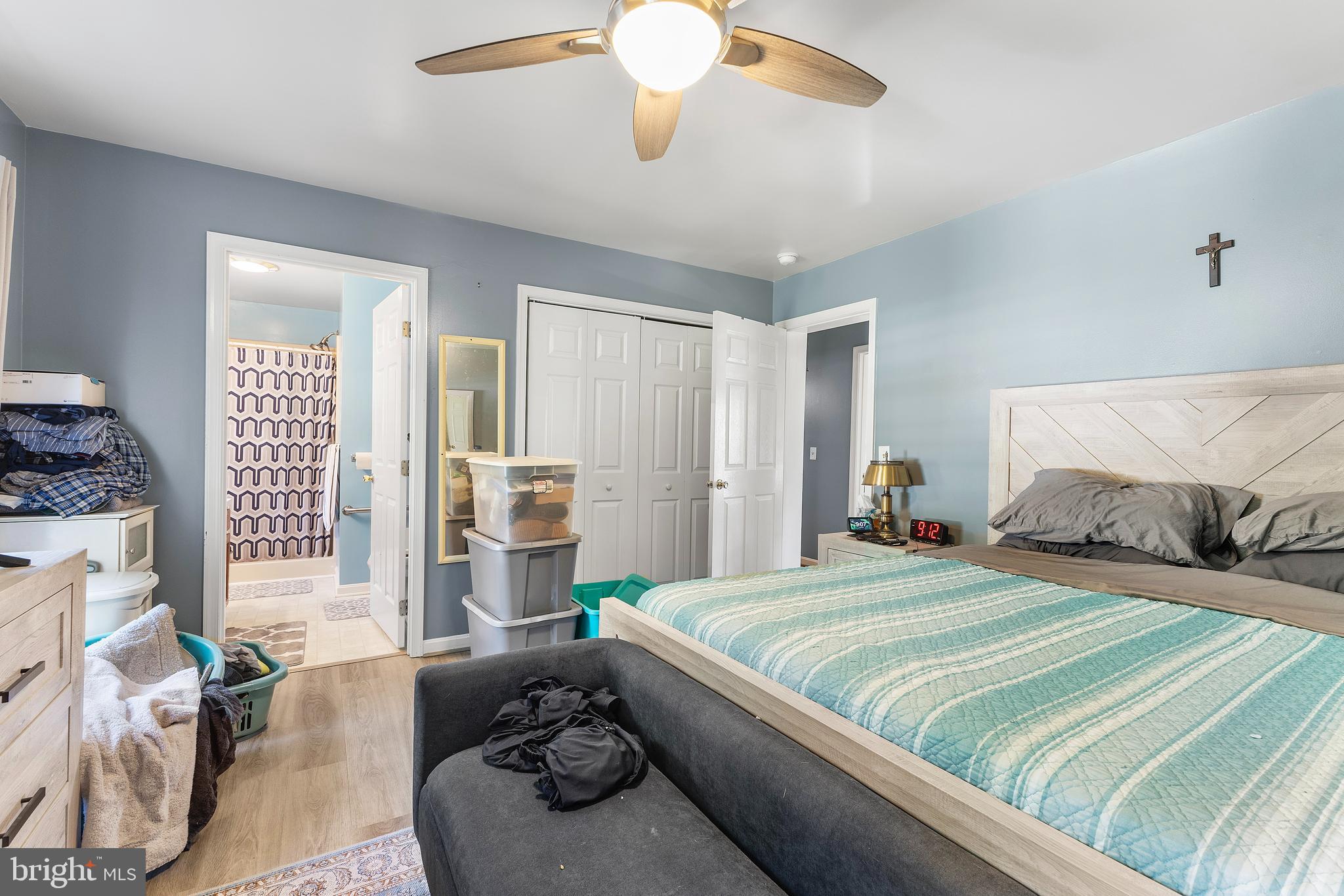 7112 East New Market Ellwood Road Hurlock, MD 21643 - Photo 6 of 41 a bedroom with a bed and wooden floor