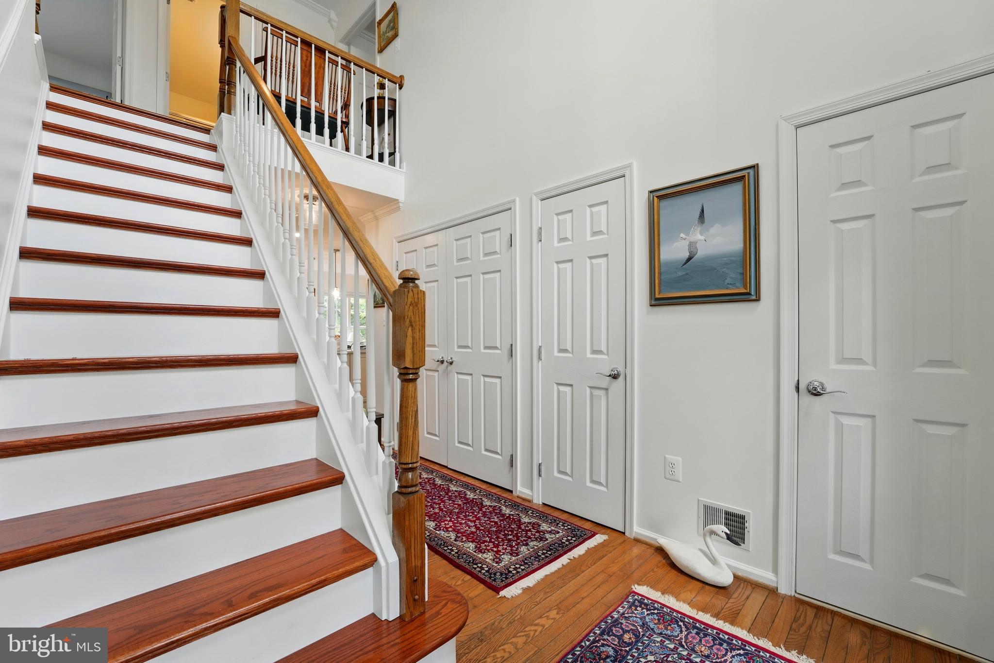 430 Devon Drive Warrenton, VA 20186 - Photo 18 of 47 a way with wooden floor and stairs
