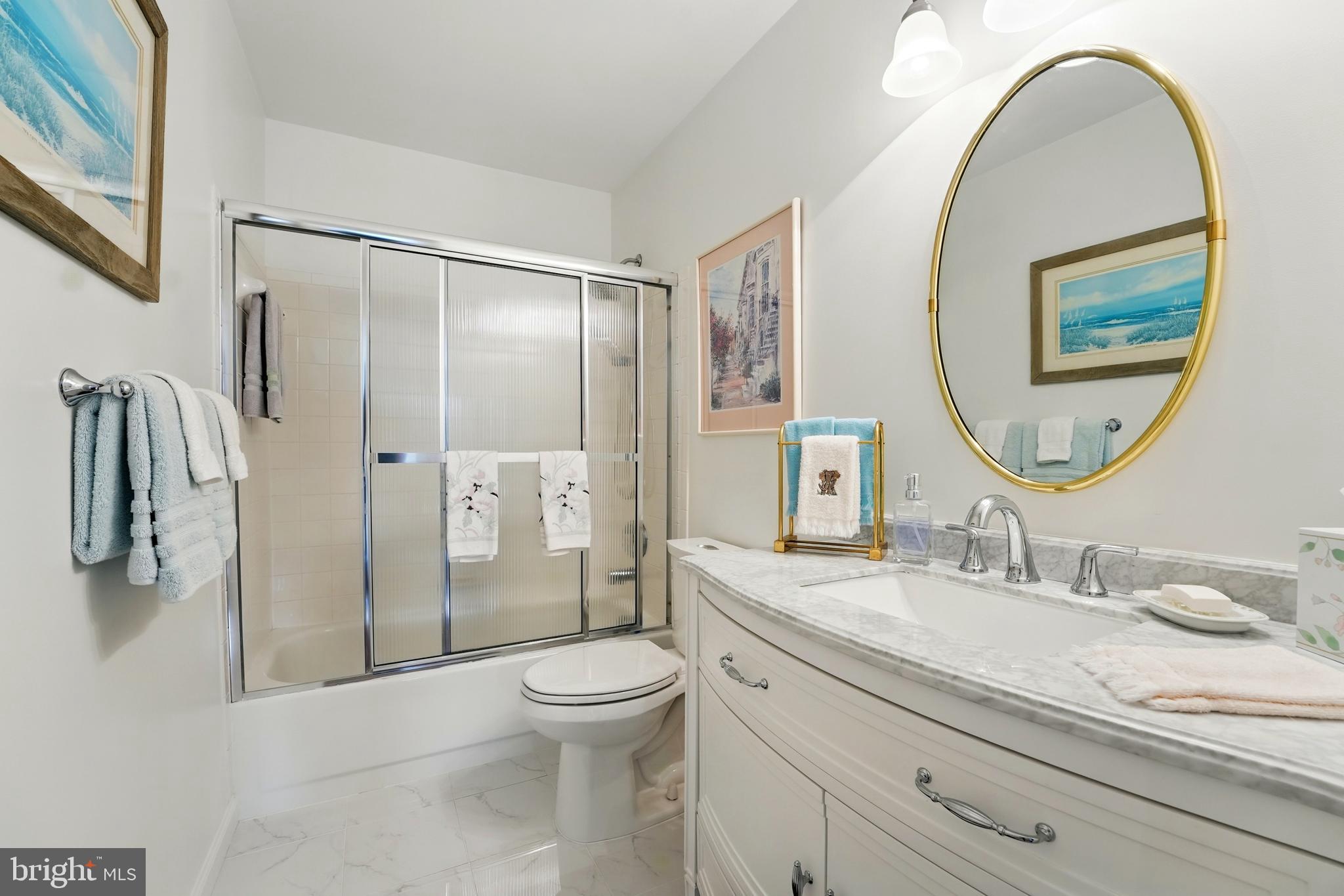 430 Devon Drive Warrenton, VA 20186 - Photo 22 of 47 a bathroom with a granite countertop sink a toilet and a mirror