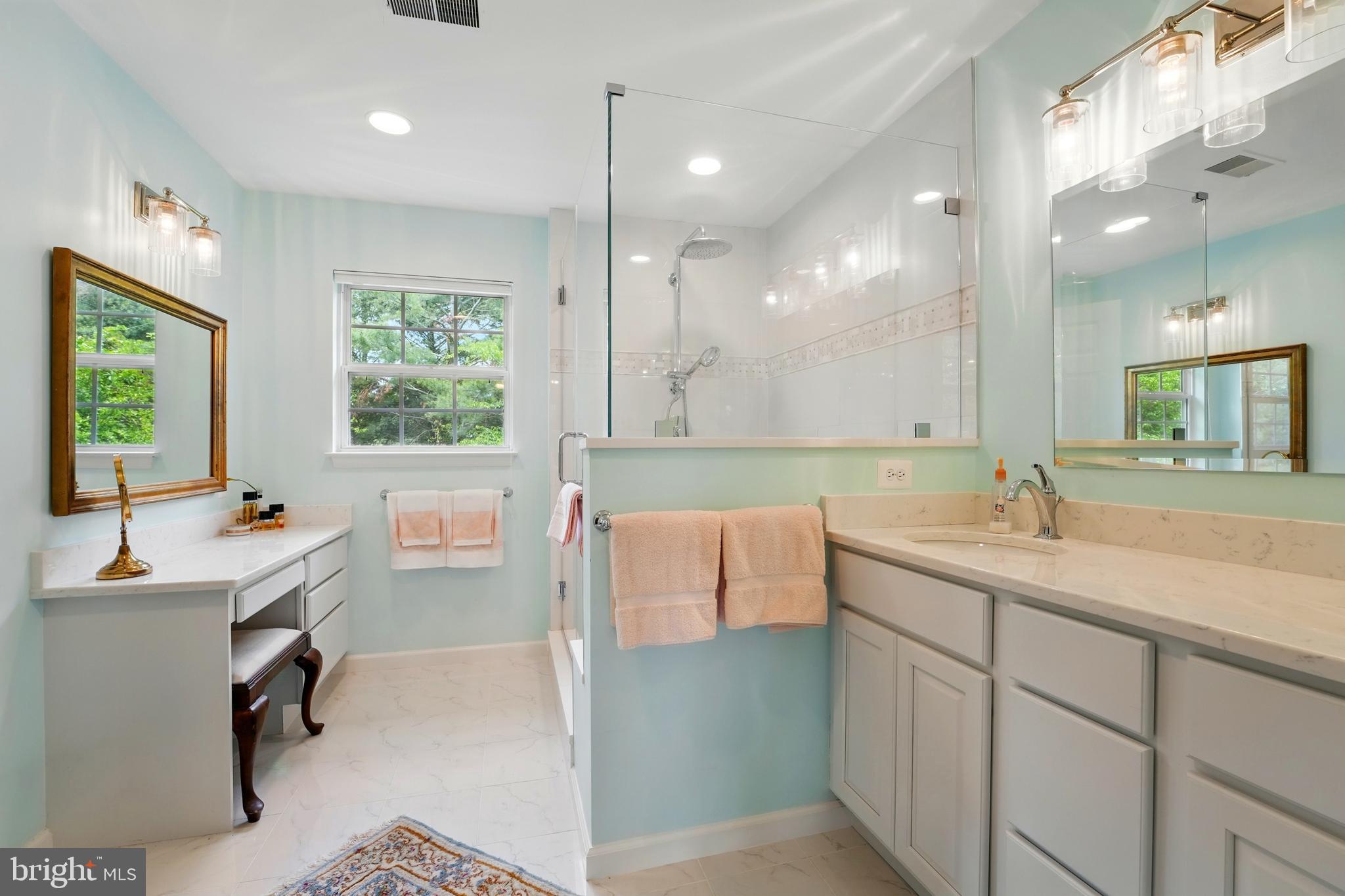 430 Devon Drive Warrenton, VA 20186 - Photo 28 of 47 a bathroom with a tub sink and mirror
