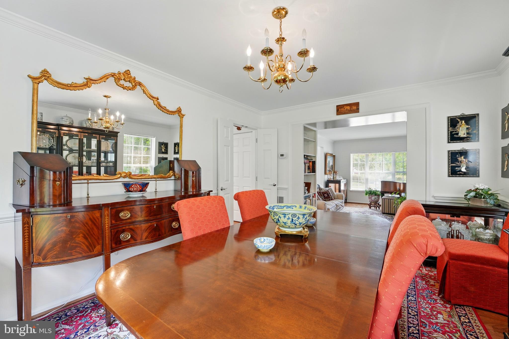 430 Devon Drive Warrenton, VA 20186 - Photo 8 of 47 a living room with furniture and a chandelier