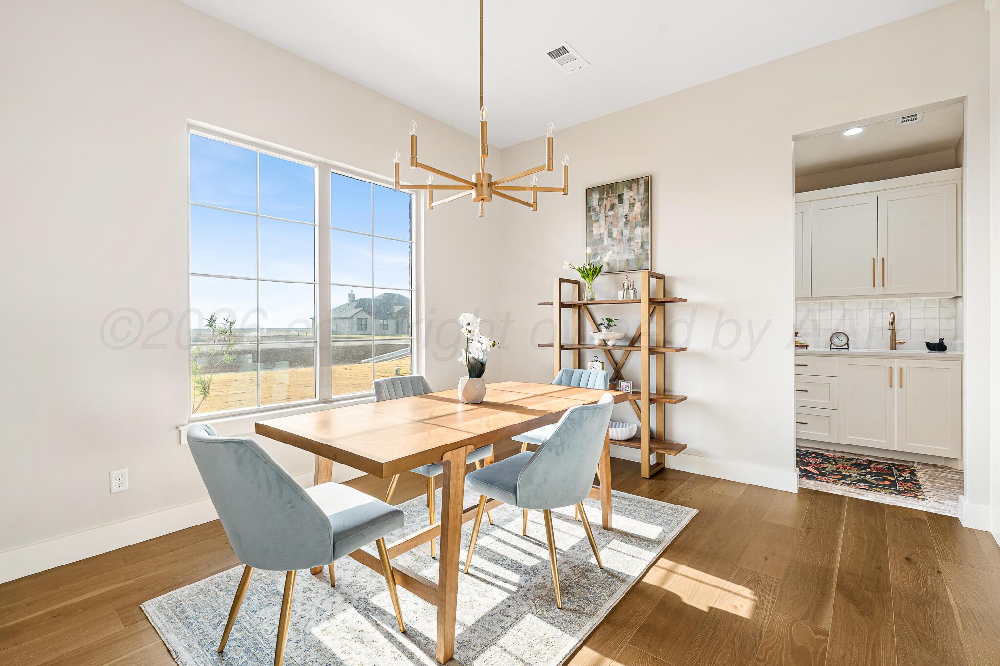 4000 Juniper Springs Road Amarillo, TX 79119 - Photo 20 of 40 a dining room with furniture and window