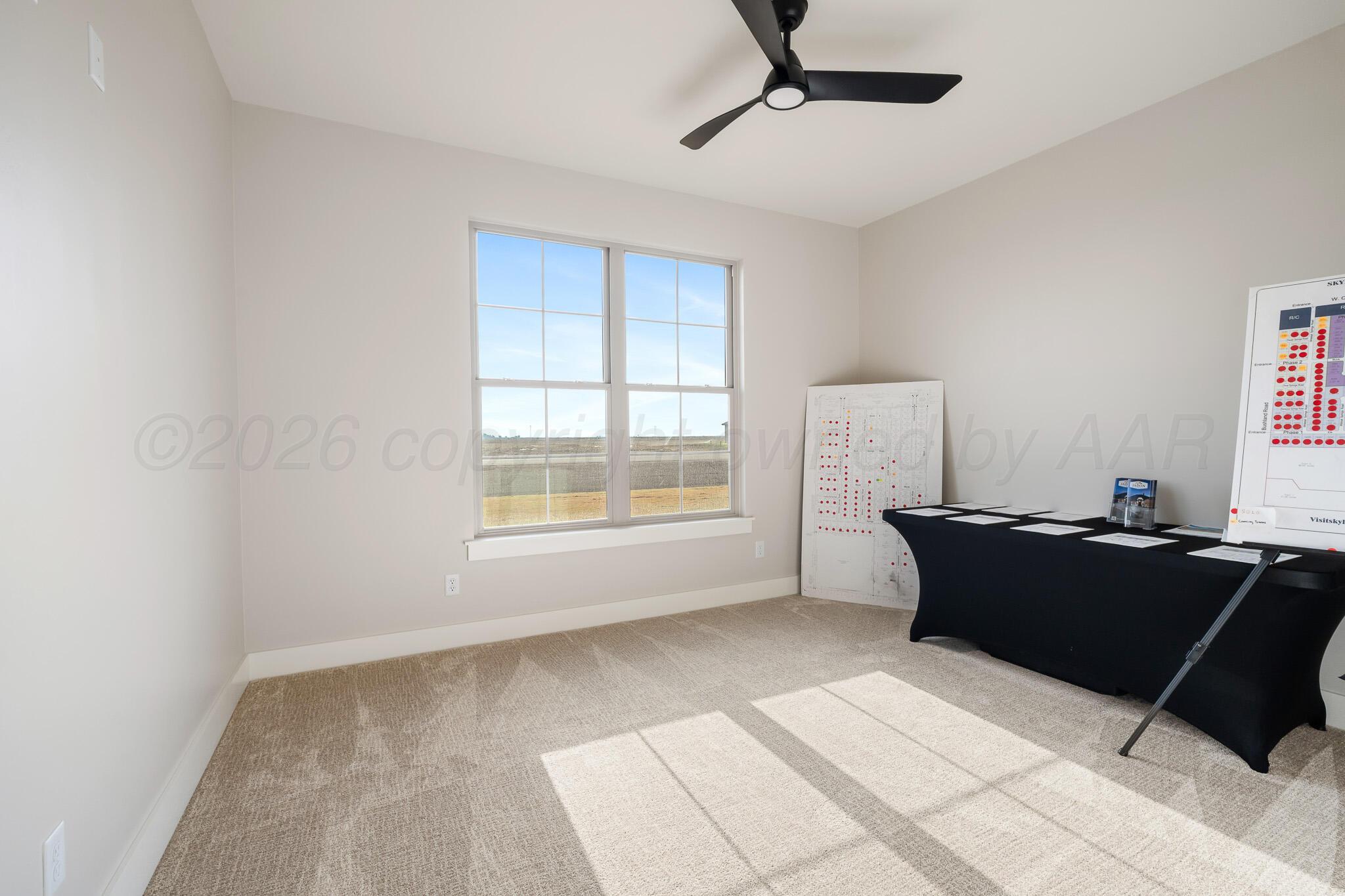 4000 Juniper Springs Road Amarillo, TX 79119 - Photo 33 of 40 a living room with furniture and a window