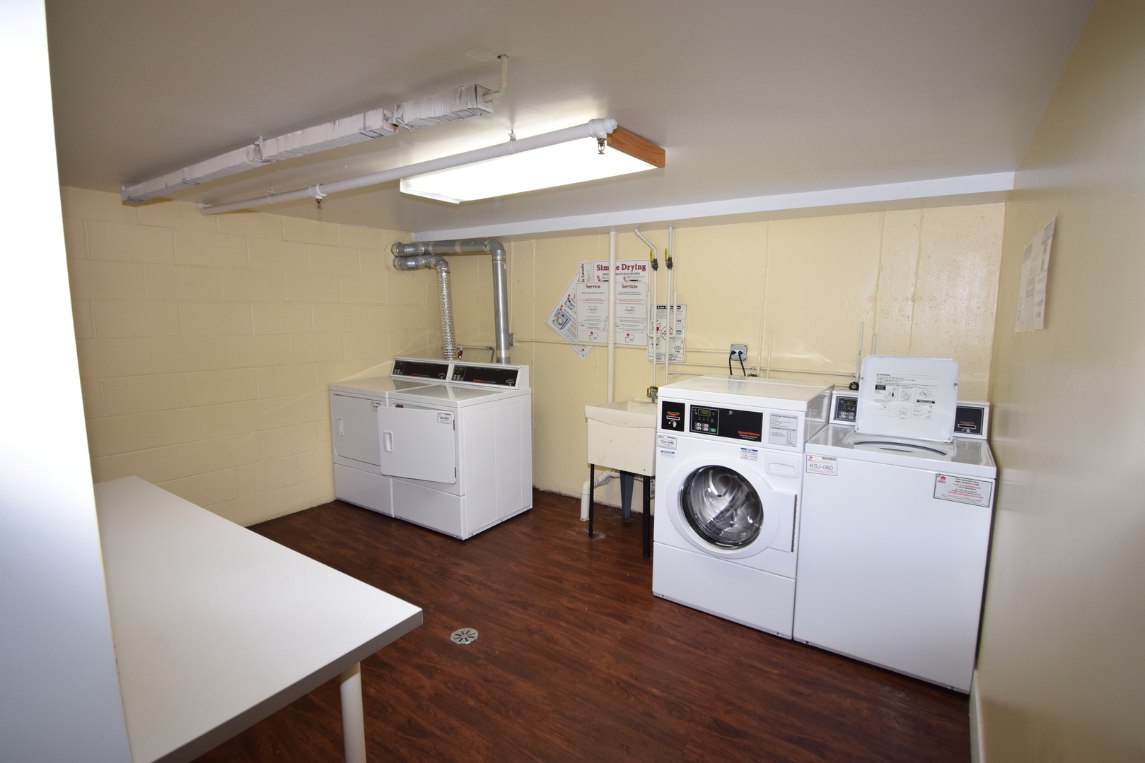 9-s120 Lake Drive, Unit 201 Willowbrook, IL 60527 - Photo 12 of 17 a utility room with dryer and washer