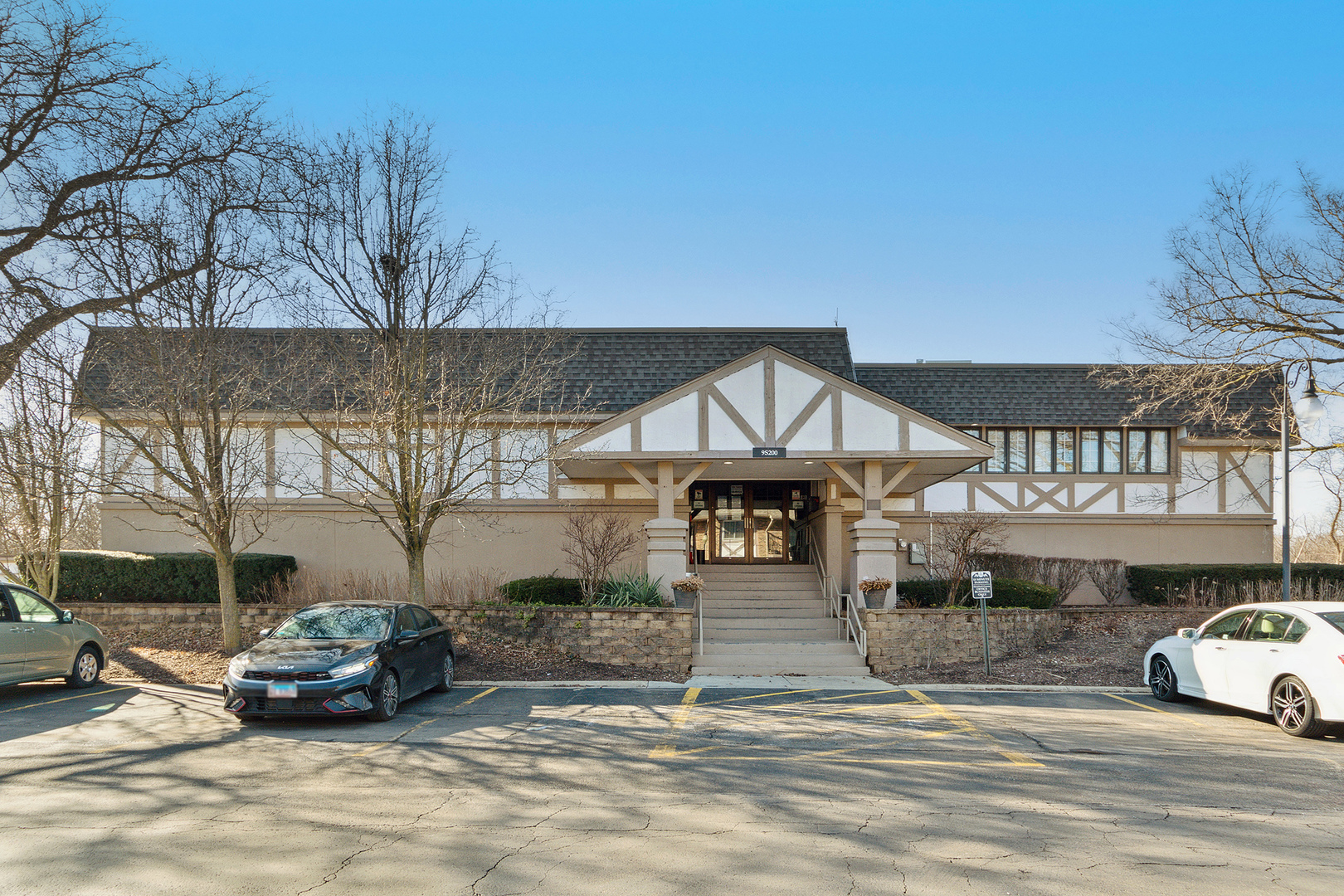 9-s120 Lake Drive, Unit 201 Willowbrook, IL 60527 - Photo 13 of 17 a view of a car parked in front of a building