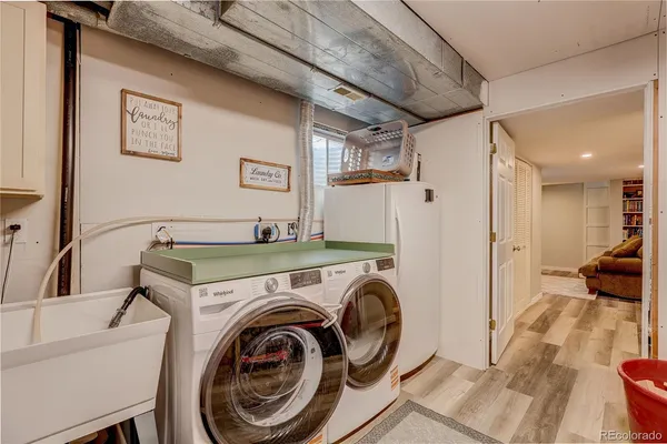 a view of livingroom with washer and dryer