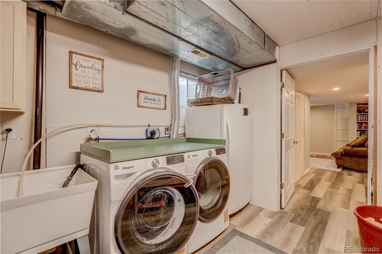 313 Front Street Roggen, CO 80652 - Photo 23 of 49 a view of livingroom with washer and dryer