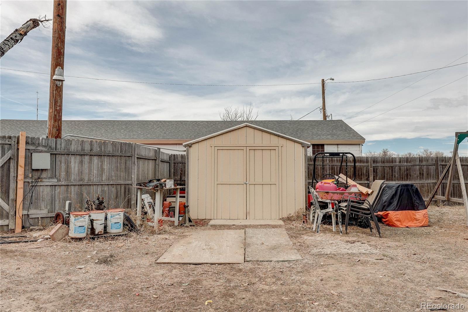 313 Front Street Roggen, CO 80652 - Photo 45 of 49 a view of a terrace with sitting area