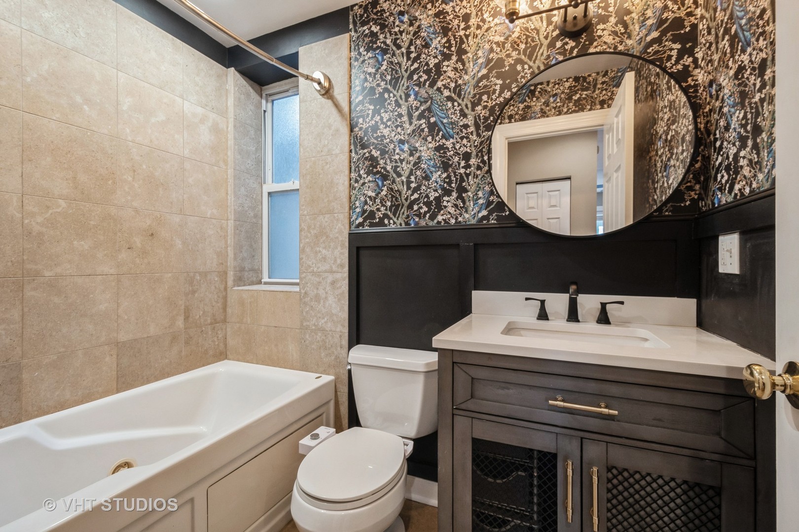 3337 West Byron Street, Unit 1 Chicago, IL 60618 - Photo 8 of 12 a bathroom with a sink a toilet and a mirror