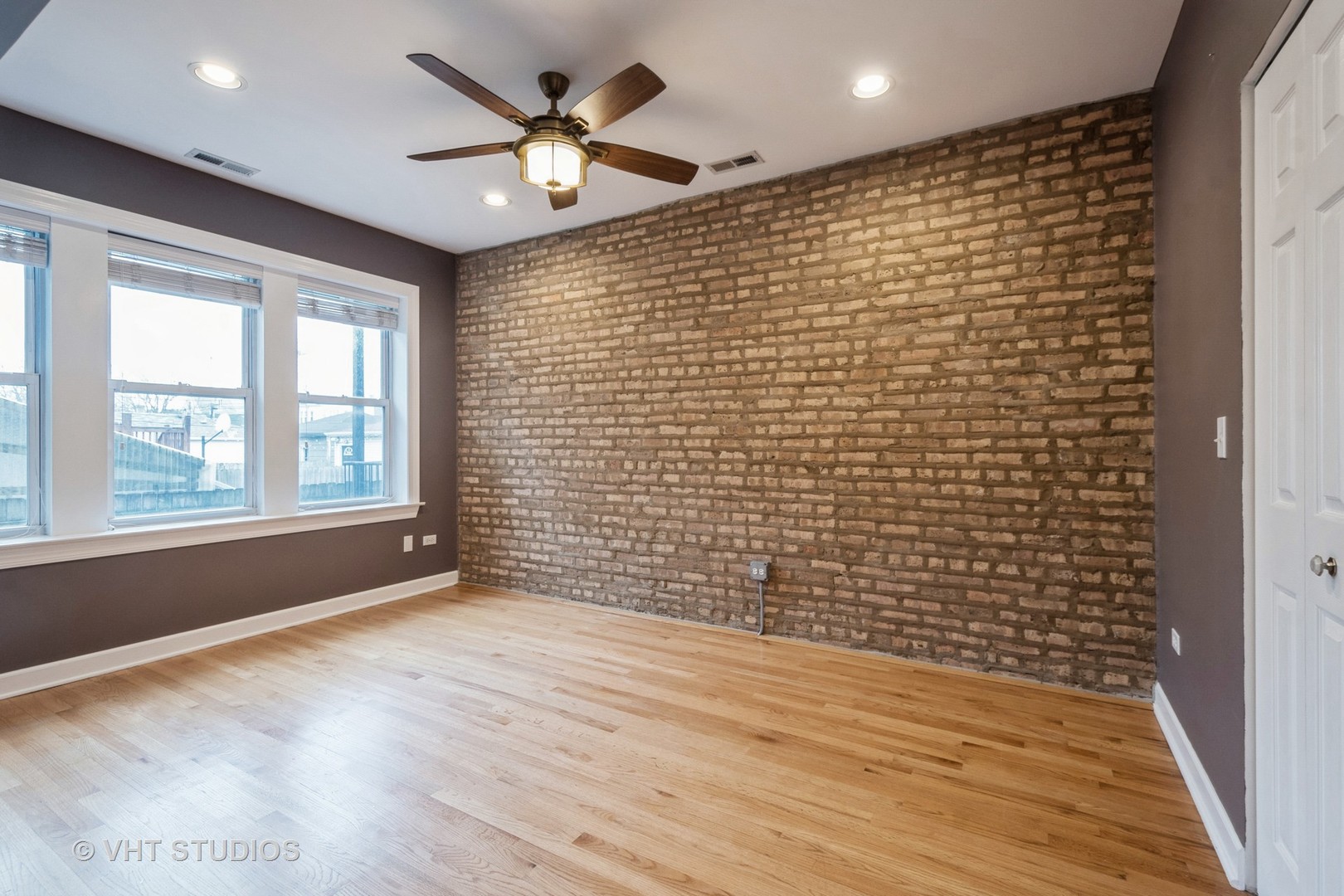 3337 West Byron Street, Unit 1 Chicago, IL 60618 - Photo 9 of 12 a view of an empty room with a window