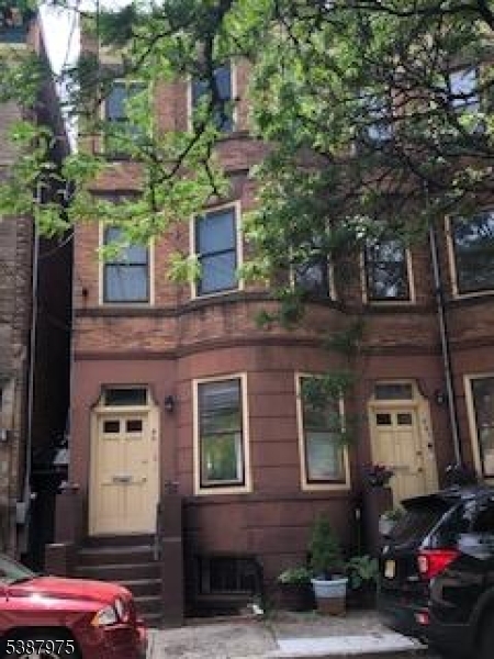 46 James Street, Unit 2 Newark, NJ 07102 - Photo 2 of 12 a front view of a building with balcony