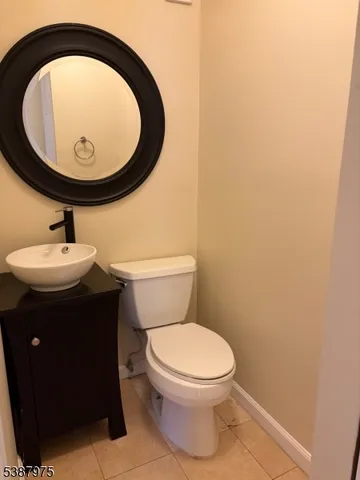 a bathroom with a toilet and a sink